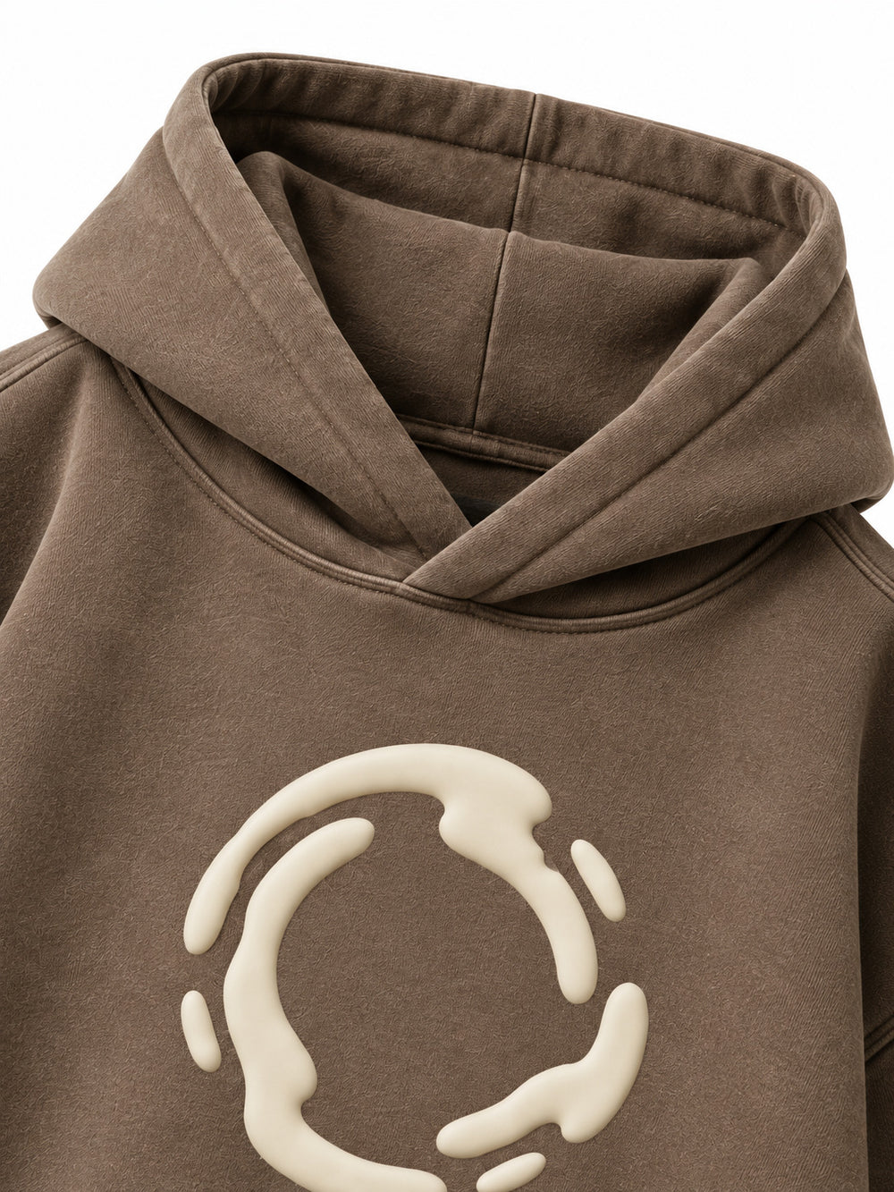 Close-up of the hood and neckline of the Soft Orbit washed mocha puff print oversized hoodie