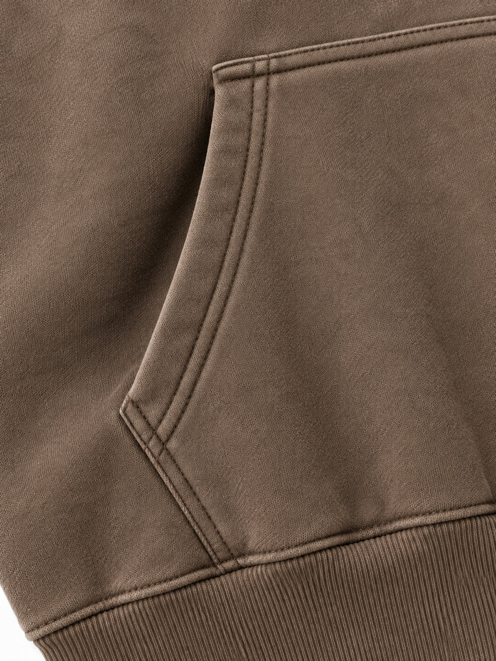 Close-up of the seam stitching of the Soft Orbit washed mocha puff print oversized hoodie