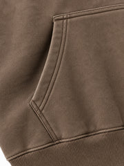 Close-up of the seam stitching of the Soft Orbit washed mocha puff print oversized hoodie