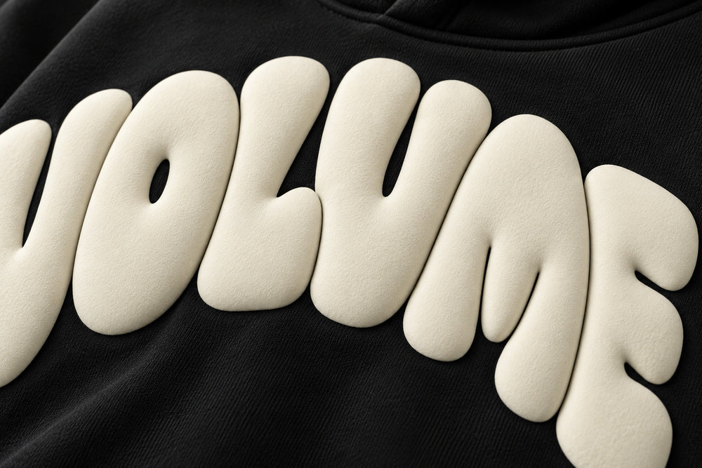 Close-up of the puff print decoration on the Volume black puff print oversized hoodie