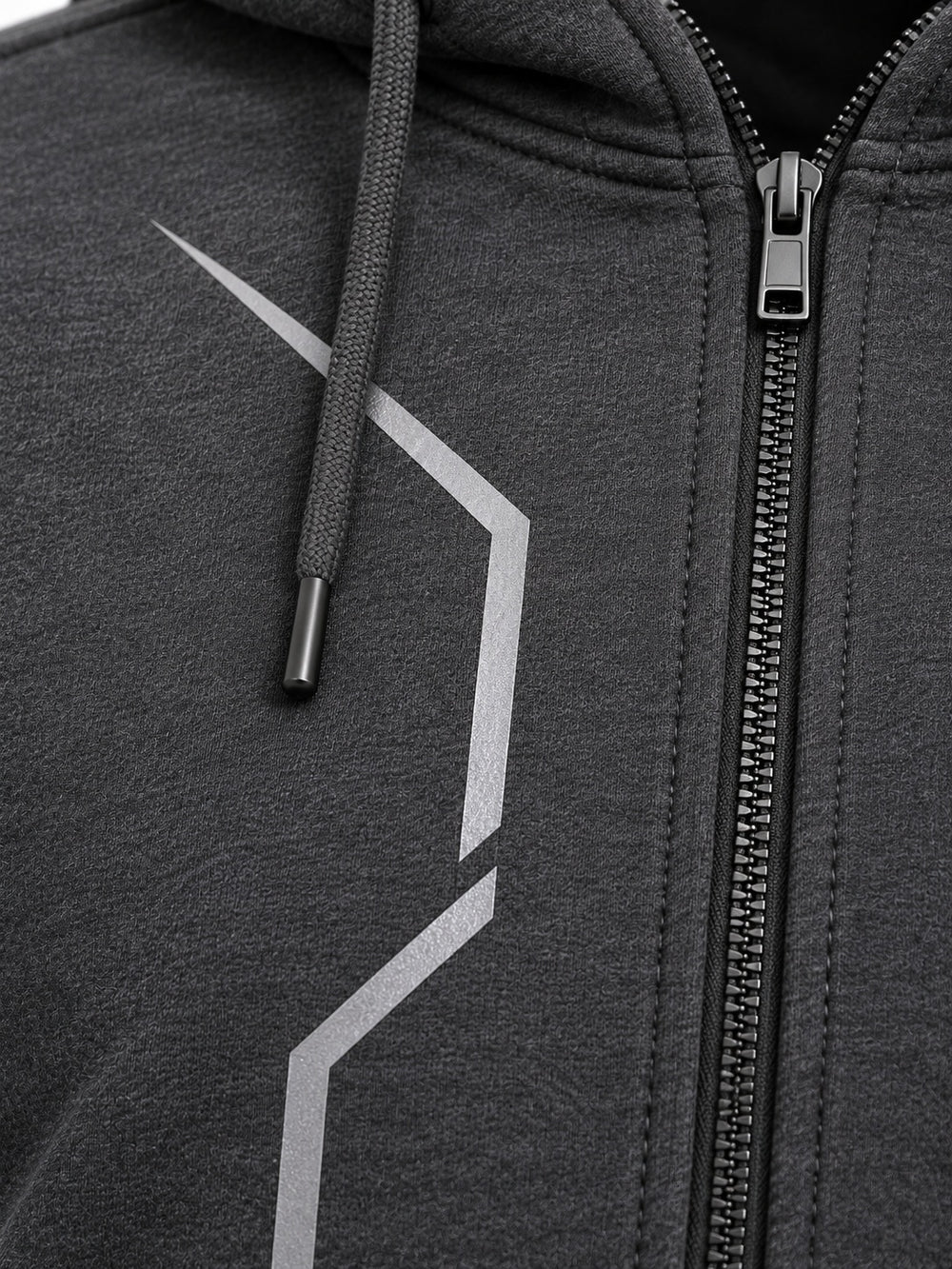 Close-up of the reflective print decoration on the After Dark graphite reflective print zip-up hoodie