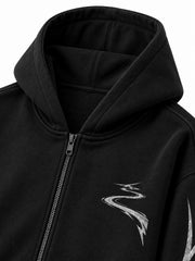 Close-up of the hood and neckline of the Night Trail black reflective print zip-up hoodie