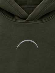 Close-up of the reflective print decoration on the Road Arc olive reflective print hoodie