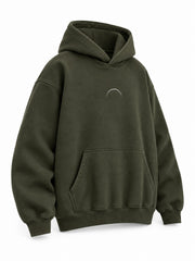 Front three-quarter view of the Road Arc olive reflective print hoodie