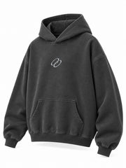 Front three-quarter view of the Signal Loop charcoal reflective print boxy hoodie
