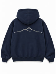 Back view of the Silver Horizon navy reflective print zip-up hoodie with a larger silver-tone mountain-horizon line