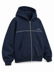 Front three-quarter view of the Silver Horizon navy reflective print zip-up hoodie