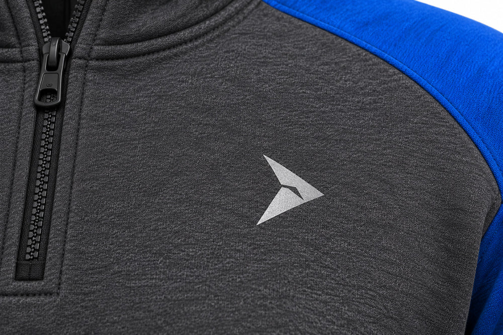 Close-up of the reflective print decoration on the Transit Quarter Zip charcoal and cobalt reflective print quarter-zip hoodie