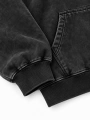 Detail view of the Orbit Constellation washed black rhinestone oversized hoodie
