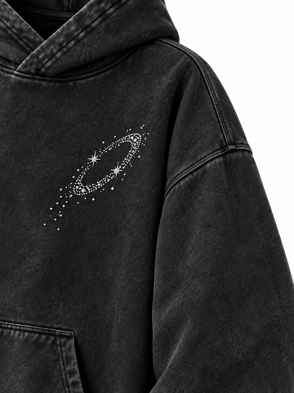 Close-up of the shoulder seam of the Orbit Constellation washed black rhinestone oversized hoodie