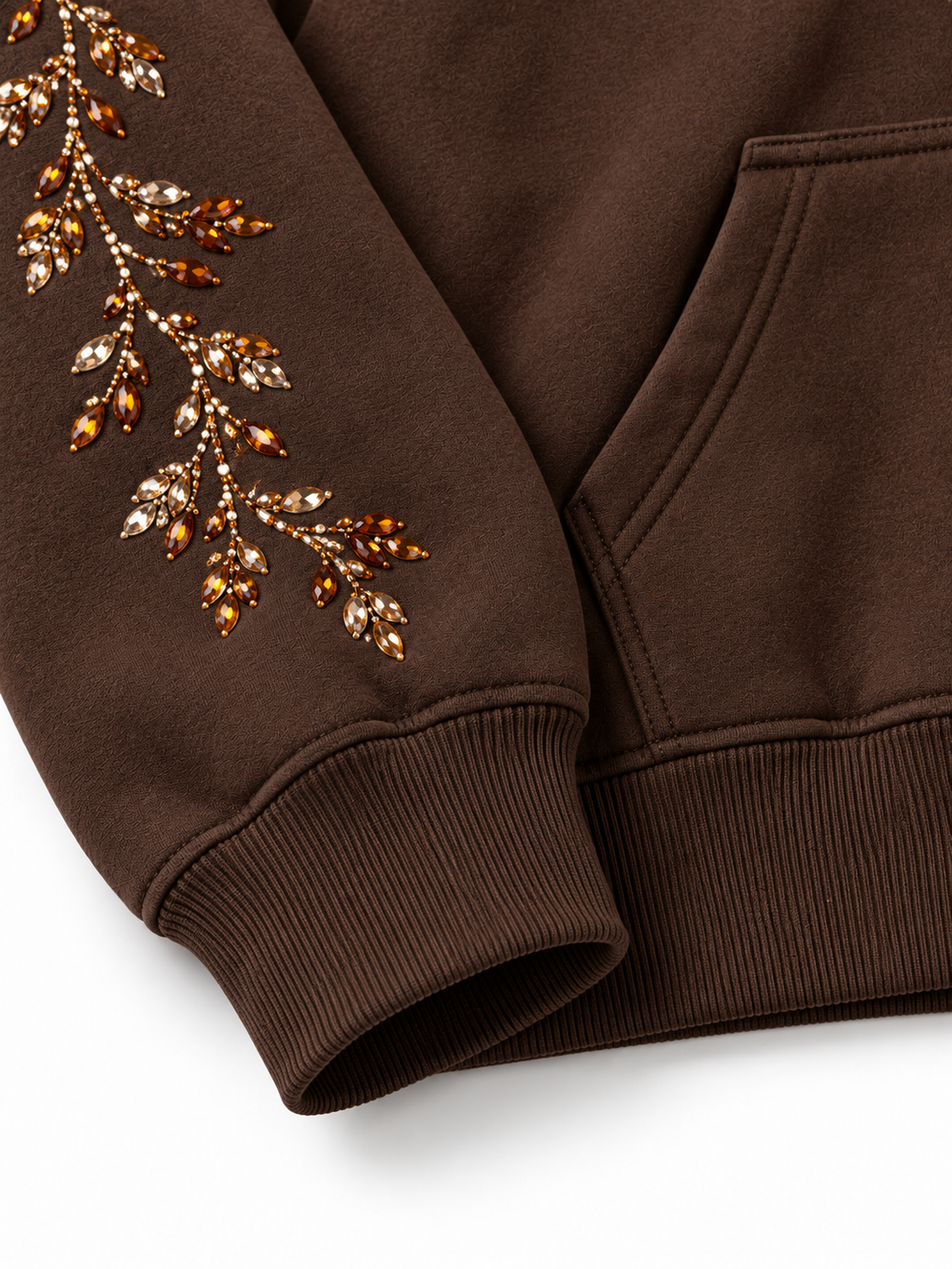 Close-up of the cuff and hem rib of the Crystal Vine espresso brown rhinestone boxy hoodie