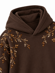 Close-up of the hood and neckline of the Crystal Vine espresso brown rhinestone boxy hoodie