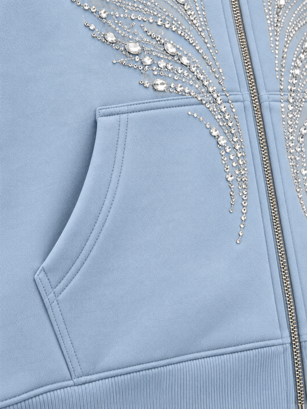 Close-up of the seam stitching of the Ice Wings icy blue rhinestone zip-up hoodie