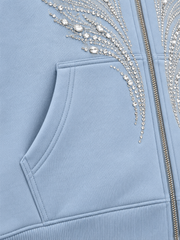 Close-up of the seam stitching of the Ice Wings icy blue rhinestone zip-up hoodie
