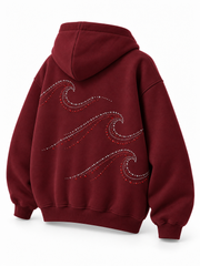 Rear three-quarter view of the Ruby Waves burgundy rhinestone oversized hoodie