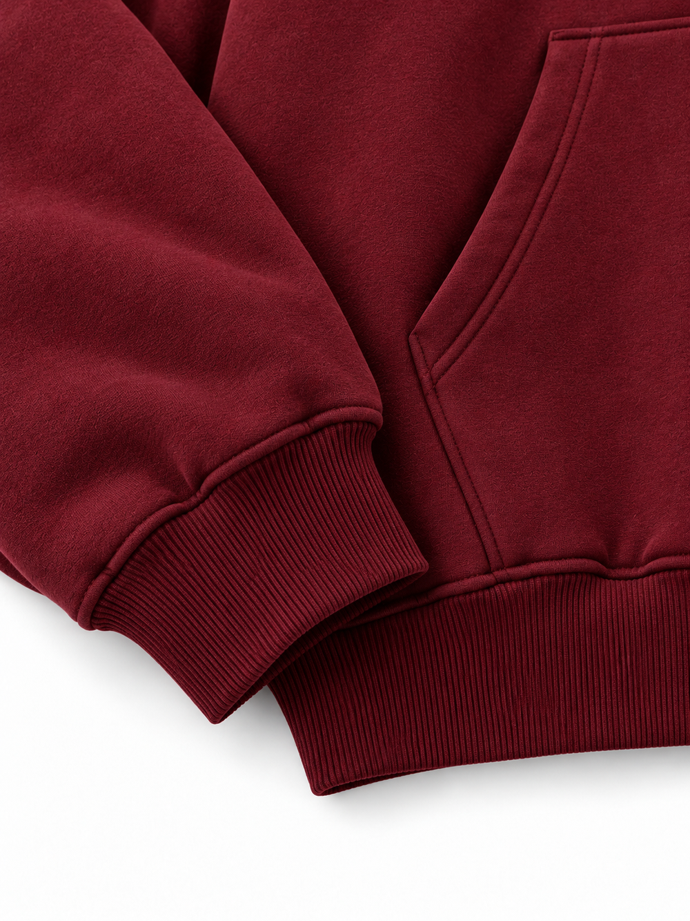 Close-up of the cuff and hem rib of the Ruby Waves burgundy rhinestone oversized hoodie