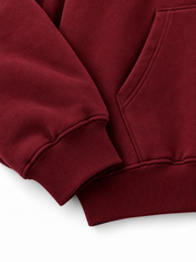 Close-up of the cuff and hem rib of the Ruby Waves burgundy rhinestone oversized hoodie