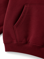 Close-up of the seam stitching of the Ruby Waves burgundy rhinestone oversized hoodie