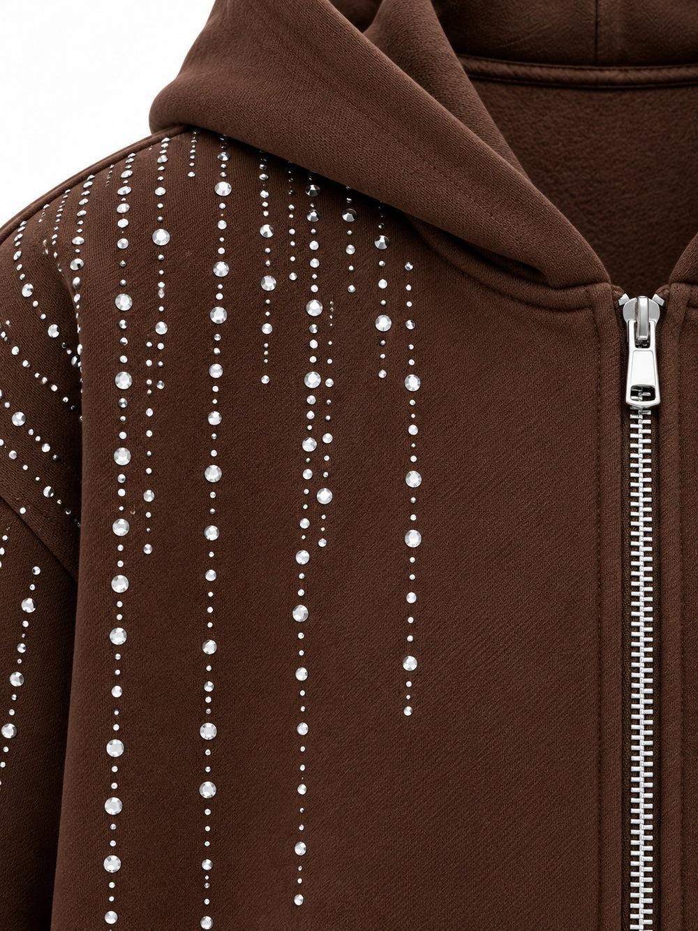 Close-up of the rhinestone decoration on the Silver Rain chocolate brown rhinestone boxy zip-up hoodie