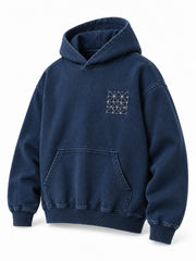 Front three-quarter view of the Indigo Grid indigo sashiko stitch boxy hoodie