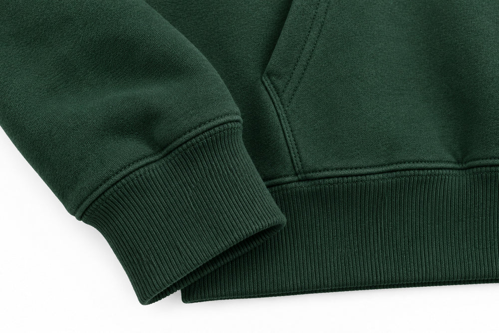 Close-up of the seam stitching of the Camp Fire forest green screen print hoodie