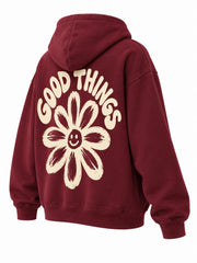 Rear three-quarter view of the Good Things burgundy screen print oversized hoodie