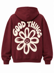 Back view of the Good Things burgundy screen print oversized hoodie with large hand-drawn cream daisy with GOOD THINGS curved around it