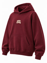 Front three-quarter view of the Good Things burgundy screen print oversized hoodie