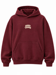 Front view of the Good Things burgundy screen print oversized hoodie with small cream GOOD THINGS lettering