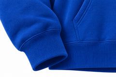 Close-up of the seam stitching of the Move Daily cobalt blue screen print hoodie