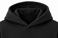 Close-up of the hood and neckline of the Open Road black screen print oversized hoodie