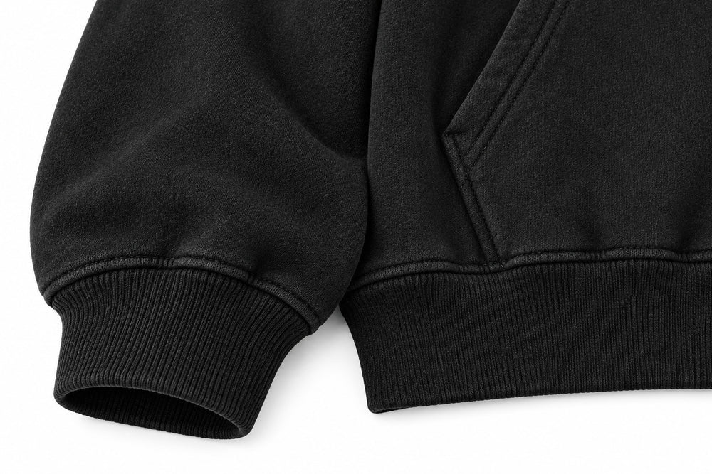 Close-up of the seam stitching of the Open Road black screen print oversized hoodie