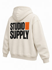 Rear three-quarter view of the Studio Supply ecru screen print boxy hoodie