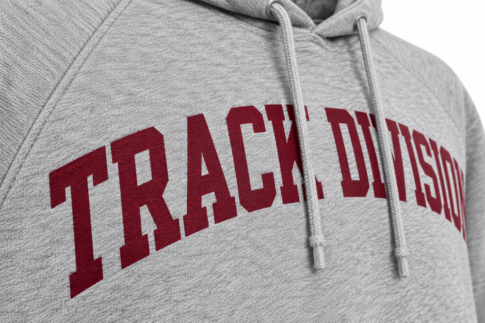 Close-up of the screen print decoration on the Track Division heather gray screen print hoodie