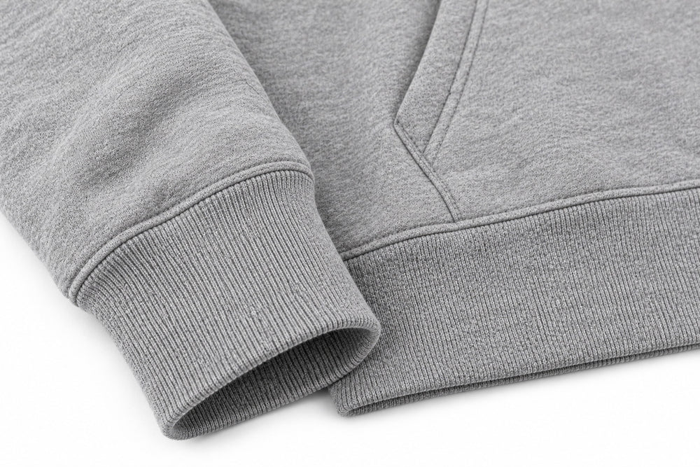Close-up of the seam stitching of the Track Division heather gray screen print hoodie