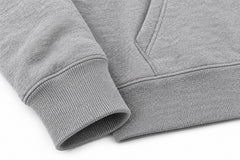 Close-up of the seam stitching of the Track Division heather gray screen print hoodie