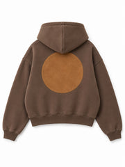 Back view of the Suede Shapes mocha suede-look appliqué oversized hoodie with a large tan circular appliqué