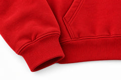 Close-up of the seam stitching of the Racing Twill red twill appliqué boxy hoodie